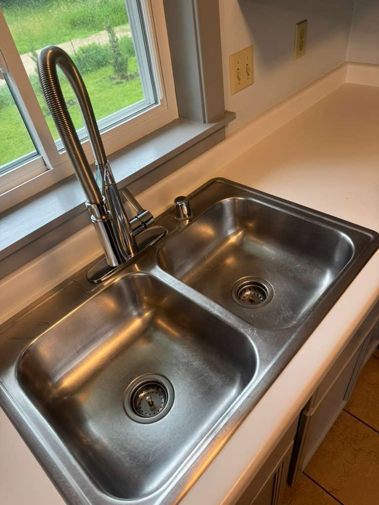 Detailed sink and faucet cleaning by IBS Cleaning Services