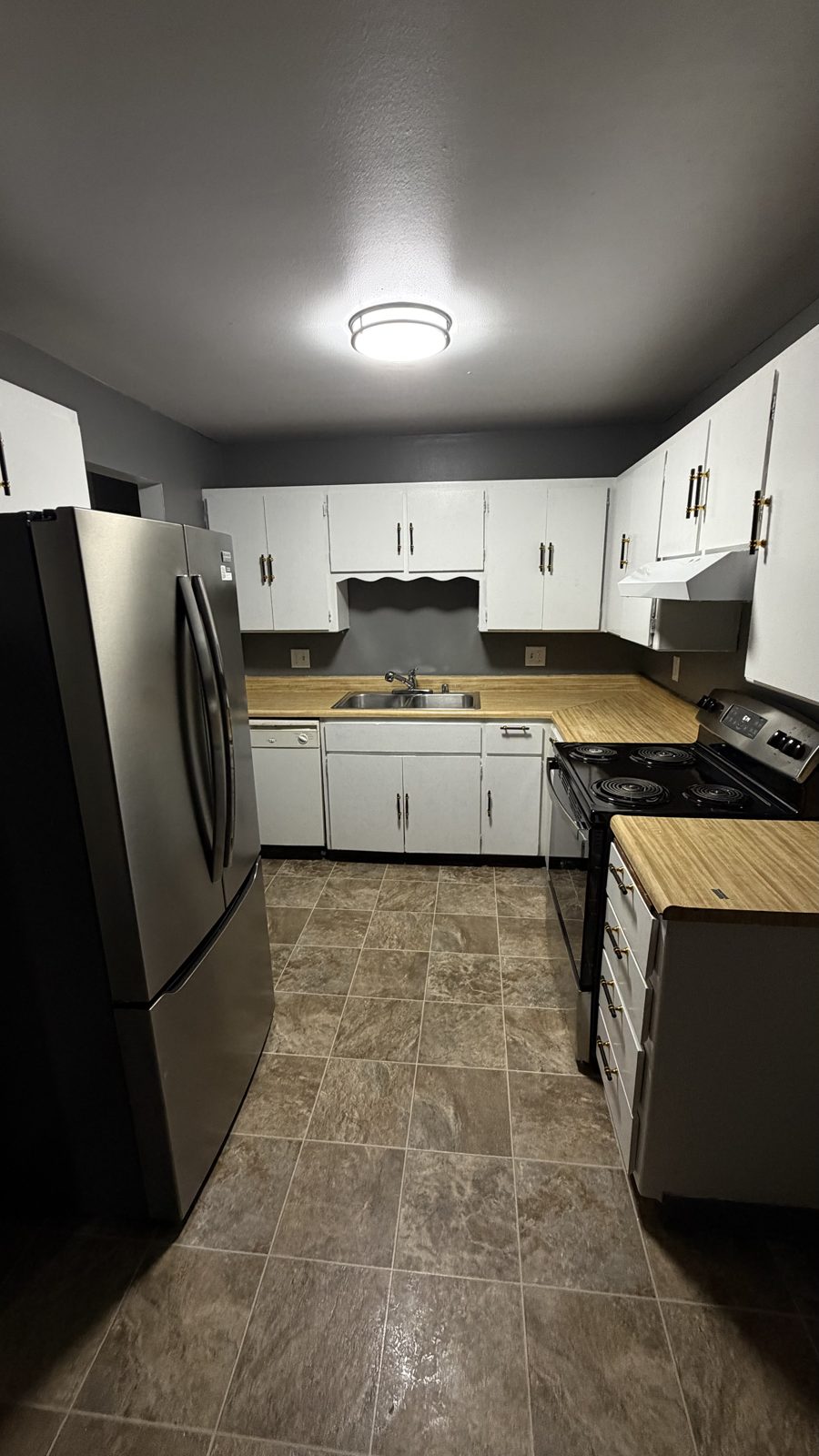 Apartment kitchen after move-out turnover cleaning