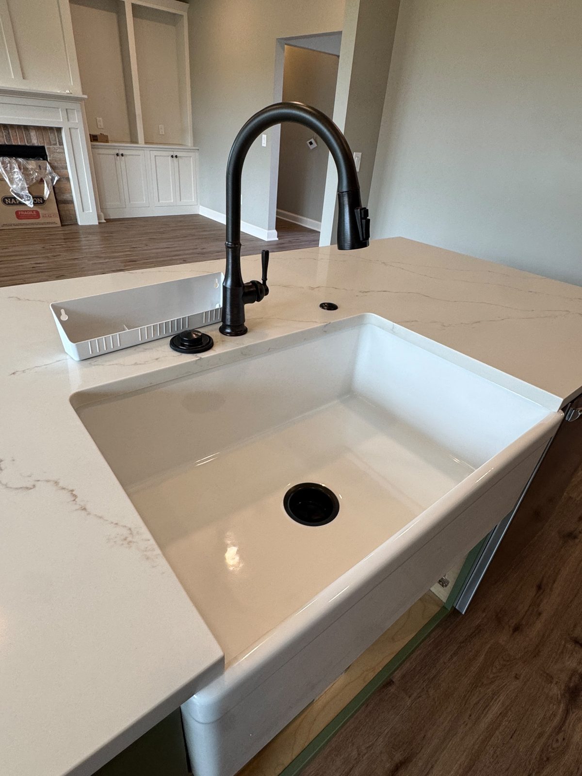 Farmhouse sink and faucet polished