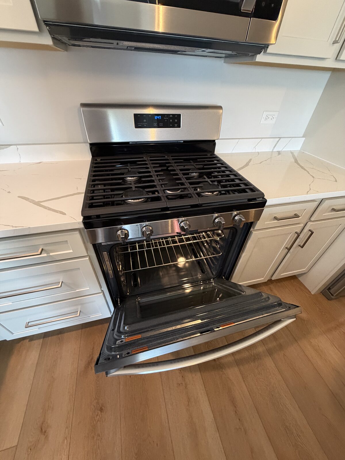 Oven and stovetop detail cleaning by IBS Cleaning Services